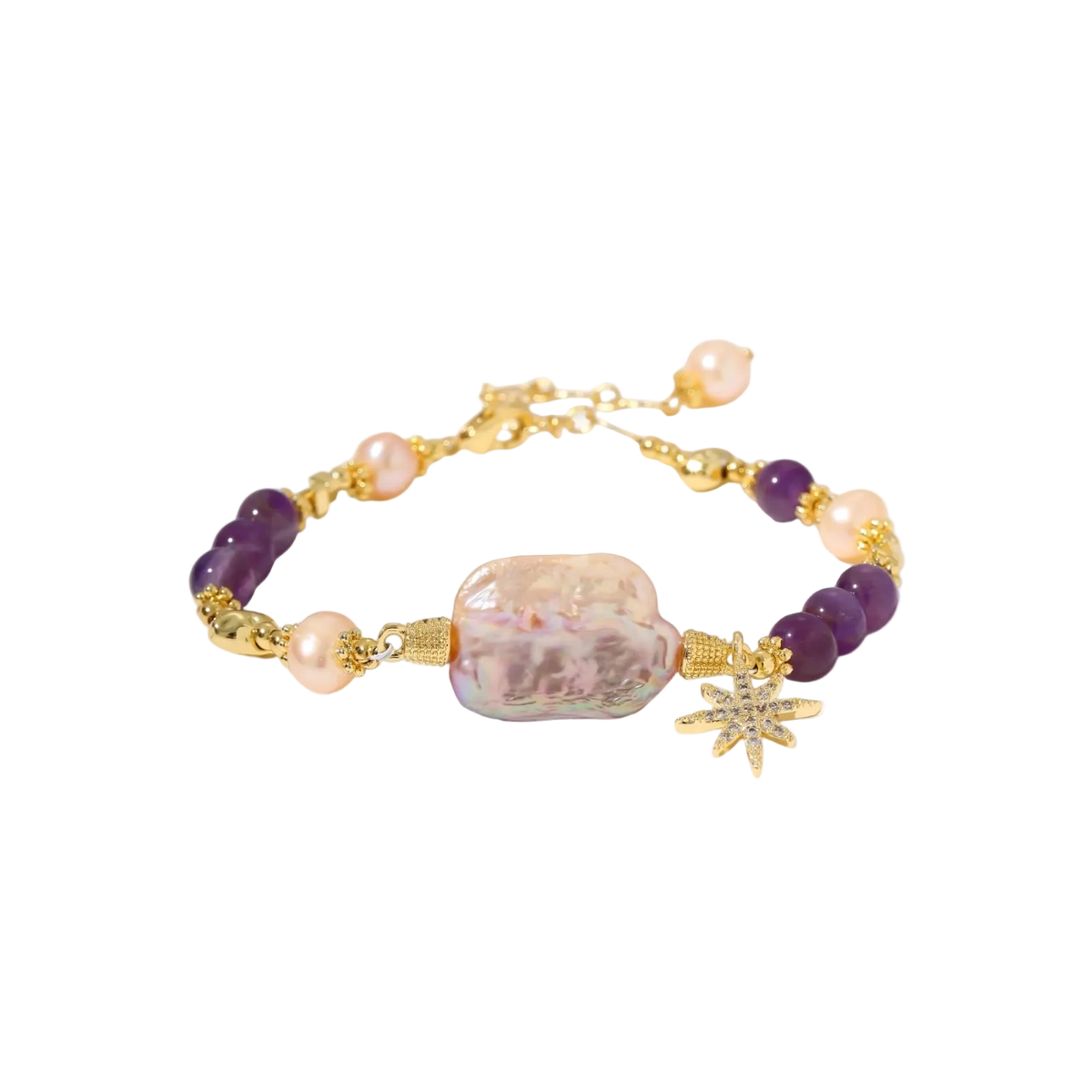 Gold-plated bracelet with baroque pearl centerpiece, amethyst beads, and crystal star charm on white background.
